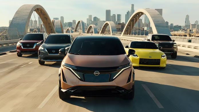 Nissan vehicles driving in a city